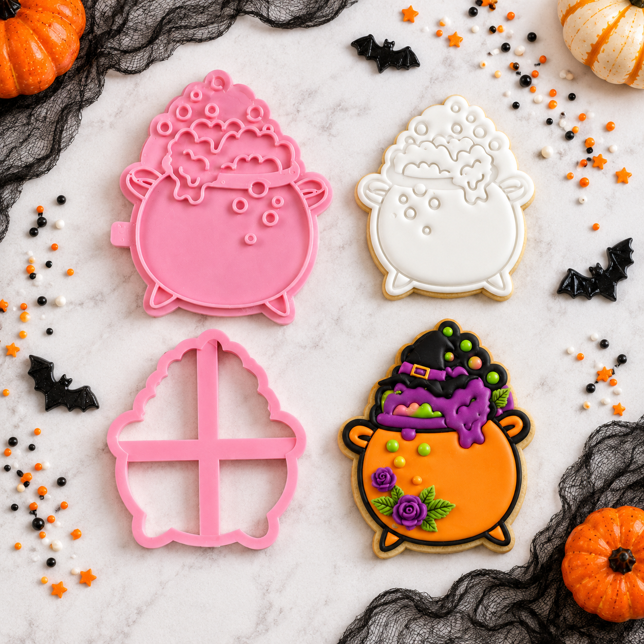 Halloween-themed cookie cutters on a decorative background with pumpkins and bats.