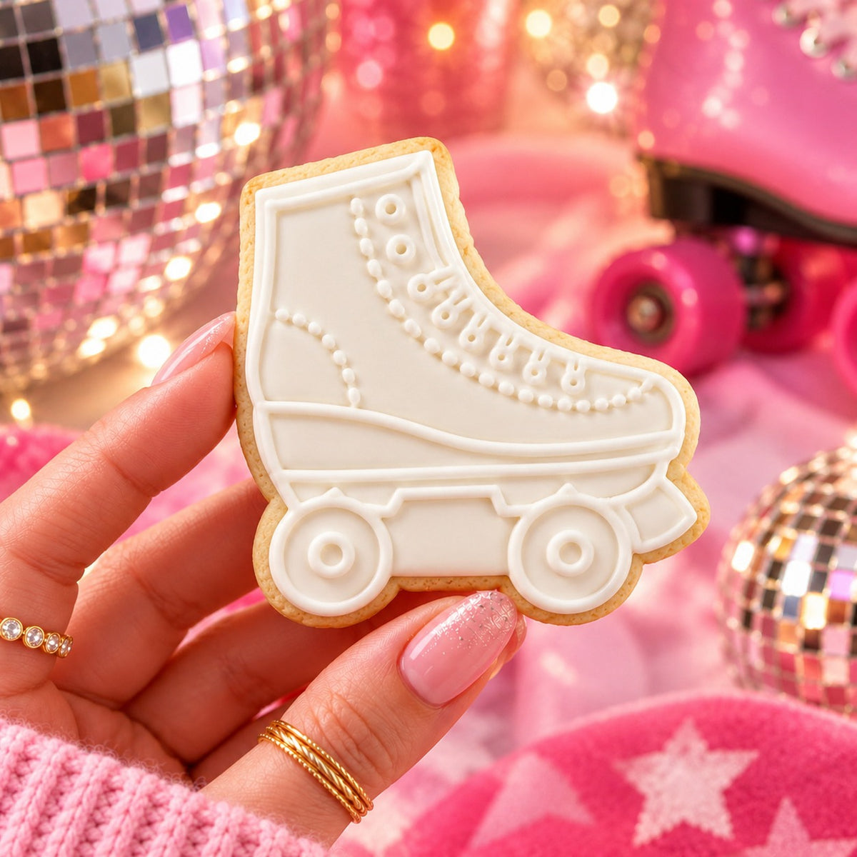 Doll Inspired Roller skate Cookie Cutter and Embosser - decorated cookie held in hand