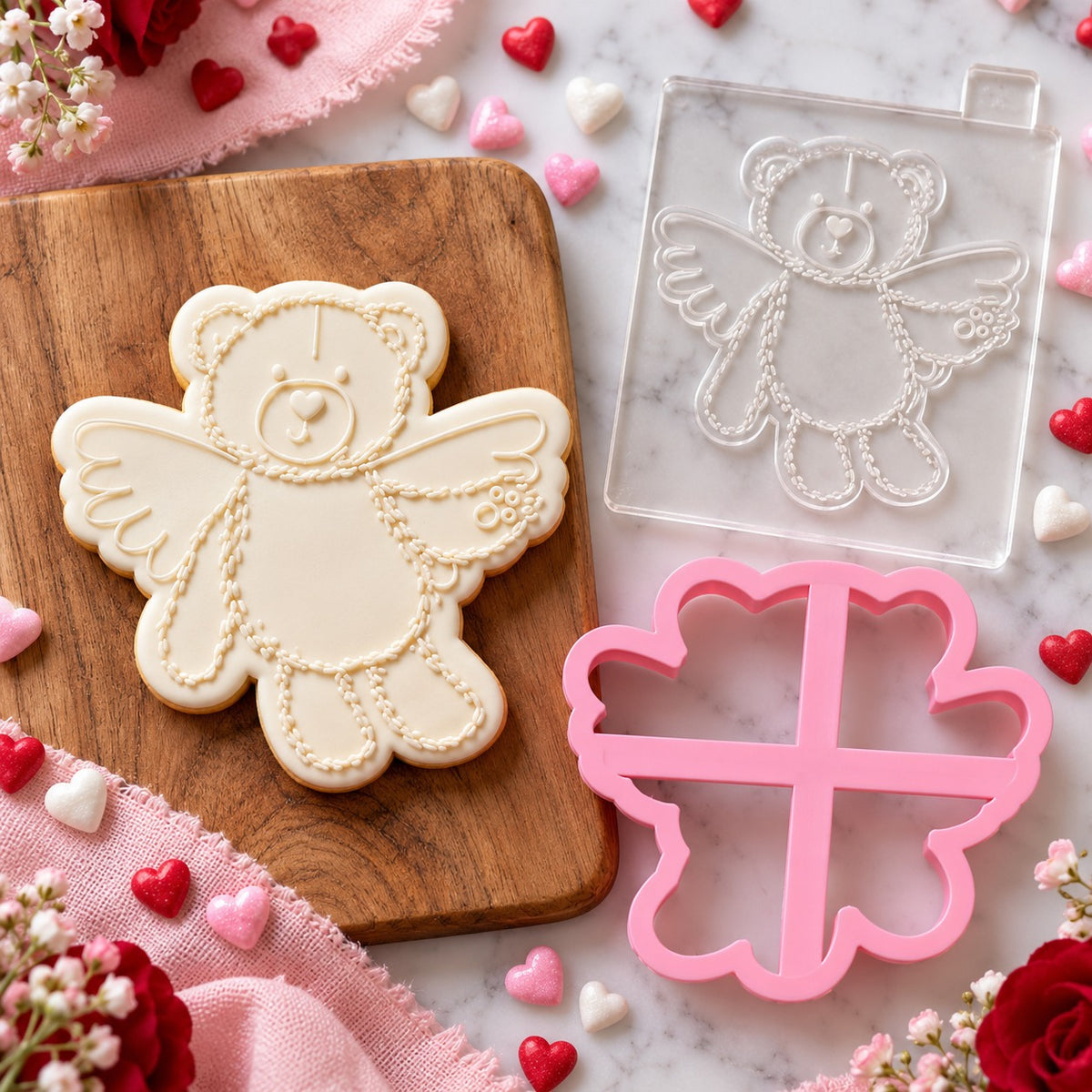 Fluffy Cupid Teddy Valentine's Cookie Cutter and Embosser - flat lay with the finished cookie