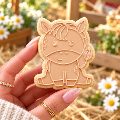 Horse Farm Yard Cookie Cutter and Embosser - decorated cookie held in hand