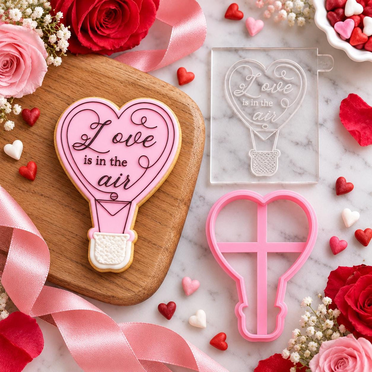 Love Is In The Air Valentine's Cookie Cutter and Embosser - flat lay with the finished cookie
