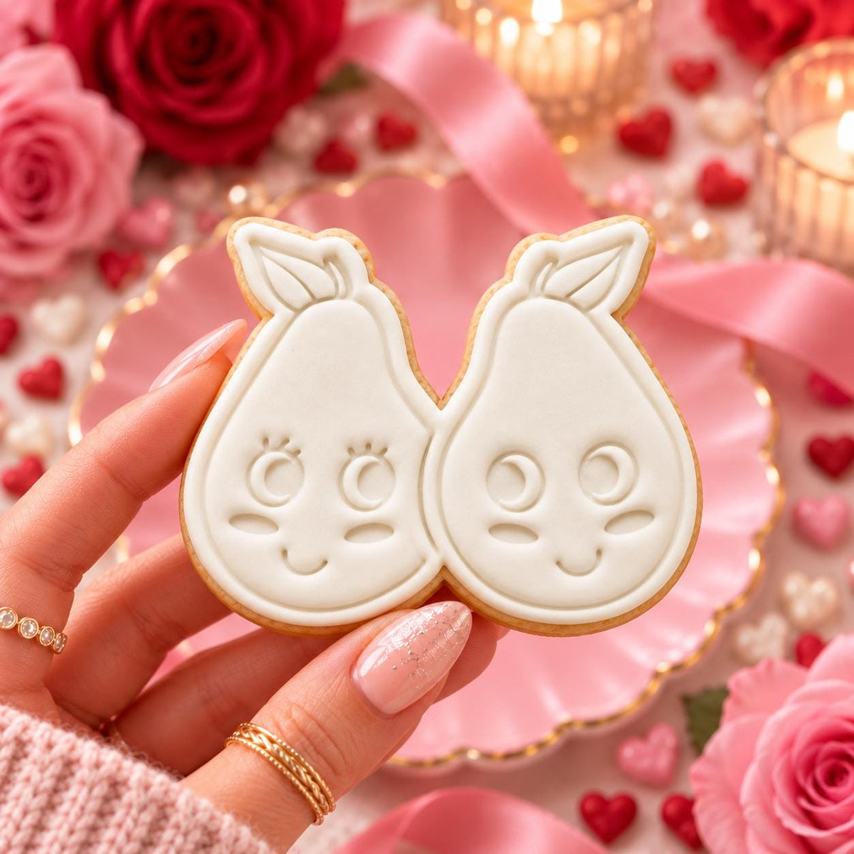 We Make A Great Pear Valentine's Cookie Cutter and Stamp - decorated cookie held in hand