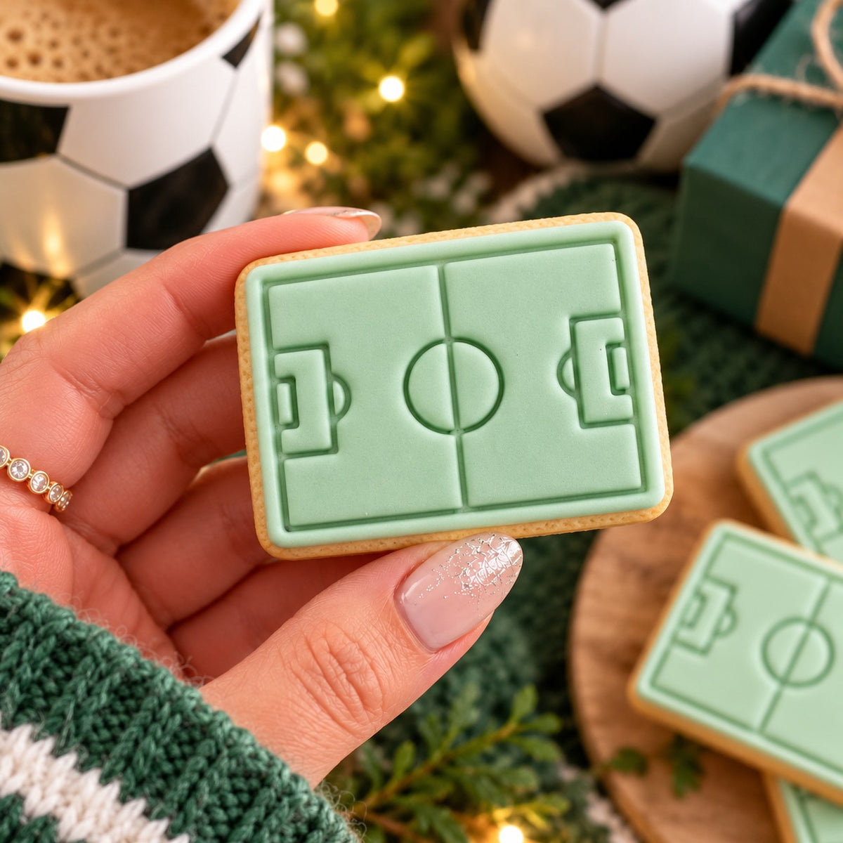 Mini Football Pitch Father's Day Cookie Cutter and Stamp - decorated cookie held in hand