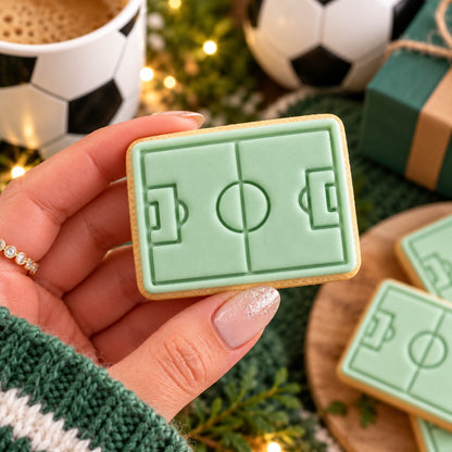 Mini Football Pitch Father's Day Cookie Cutter and Stamp - decorated cookie held in hand