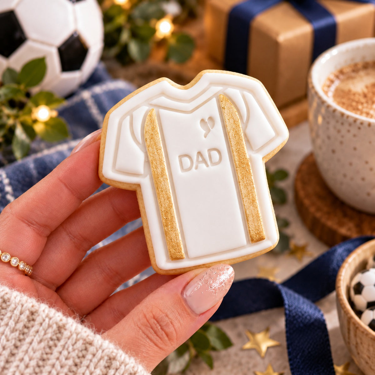 Mini Football Shirt Father's Day Cookie Cutter and Stamp - decorated cookie held in hand