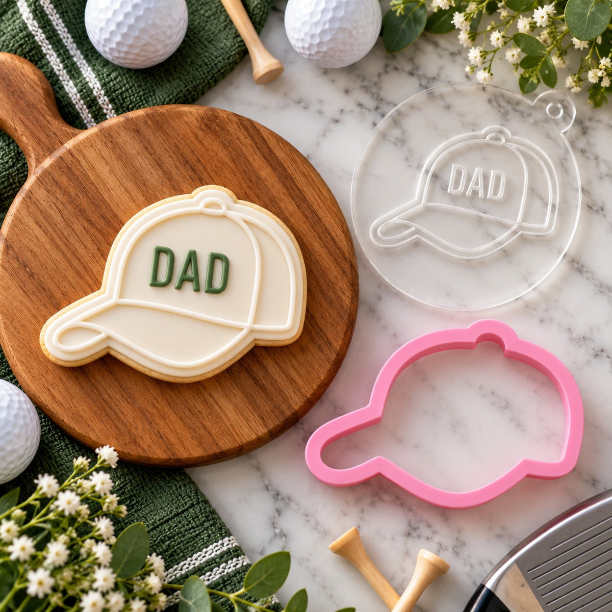 Mini Golf Cap Father's Day Cookie Cutter and Embosser - flat lay with the finished cookie