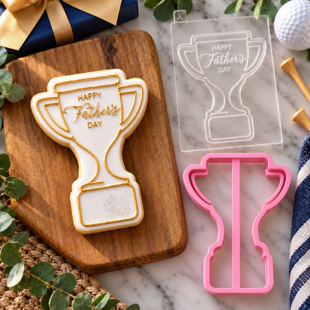 Trophy Happy Father's Day Cookie Cutter and Embosser - flat lay with the finished cookie