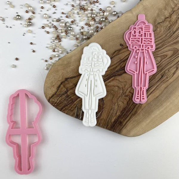 Woman Holding Presents Christmas Cookie Cutter and Stamp